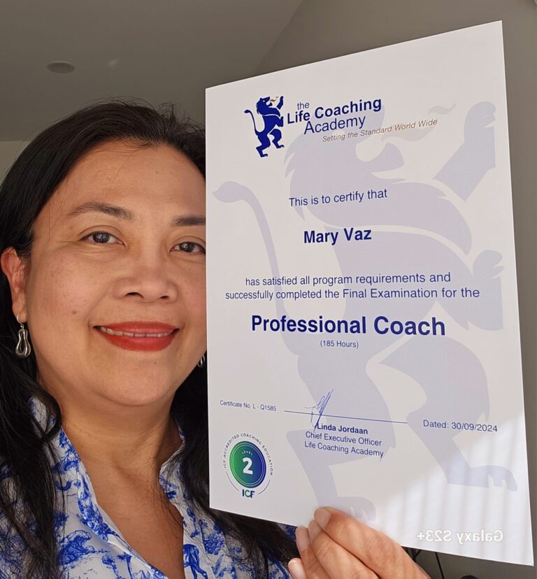 Mary Vaz and coaching certificate 768x828